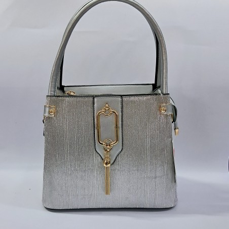 Label püsküllü simli kumaş kadın kol çantası gümüş