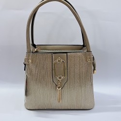 Label püsküllü simli kumaş kadın kol çantası gold