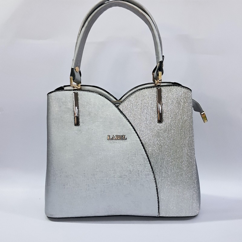 Label simli kumaş kadın kol çantası gümüş