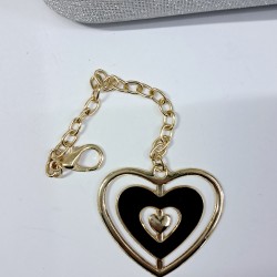 Label simli kumaş anahtarlıklı kadın kol çantası gümüş